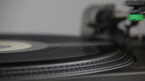 A Hand Lowers Needle Onto Record And Starts Play Turntable Stock Footage 48955644
