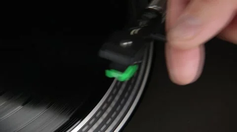A Hand Lowers Needle Onto Record And Starts Turntable Stock Footage 48955696