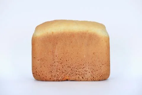 The hand-made bread made in bread baking machine on white background Stock Photos