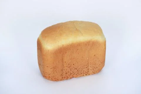 The hand-made bread made in bread baking machine on white background Stock Photos