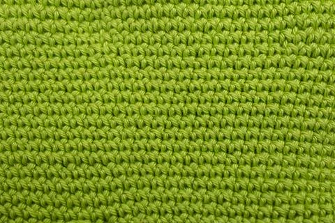 Hand made crochet pattern, textured mint green abstract background, with ho.. Foto stock