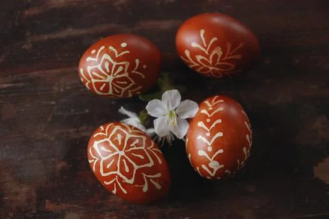 Hand made decorate Easter eggs on the dark table Stock Photos