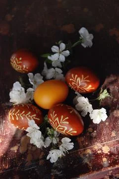 Hand made decorate Easter eggs on the dark table Stock Photos