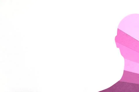 The hand made human face half cut out of paper in all shades of pink Stock Photos