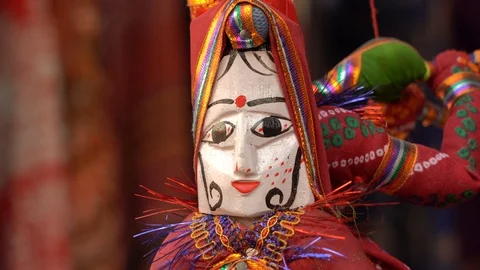 Hand made puppets attached to string in Rajasthan, India. Close up doll Stock Footage 100494165