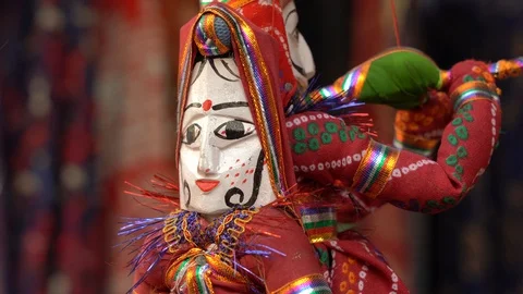 Hand made puppets attached to string in Rajasthan, India. Close up doll Stock Footage 100628420