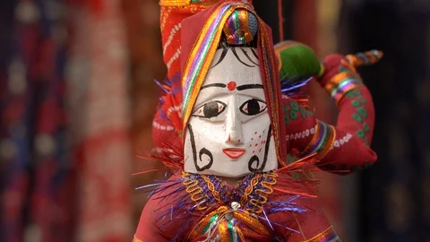 Hand made puppets attached to string in Rajasthan, India. Close up doll Stock Footage 100825958