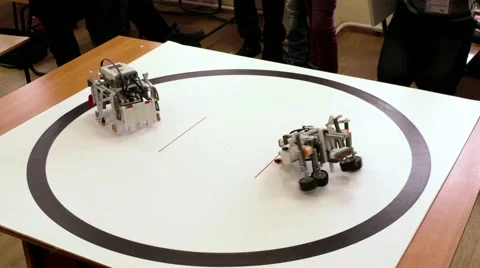Hand made robots fight in sumo ring Stock Footage 58506511