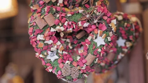 Hand made rustic wreath in shape of a heart. New year's decorations made of Stock Footage 305750146
