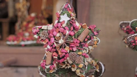 Hand made rustic wreath in shape of a star. New year's decorations made of Stock Footage 305751388