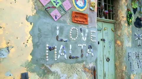 Hand-made shell sign on a wall. Stock Footage 108856016