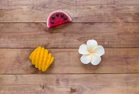 Hand made soap in the shape of fruit yellow pineapple, watermelon and flower Stock Photos
