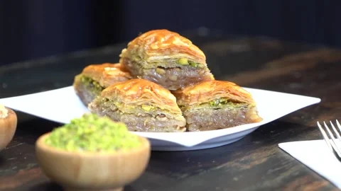 Hand-made Turkish baklava portion presentation Stock Footage 150086933