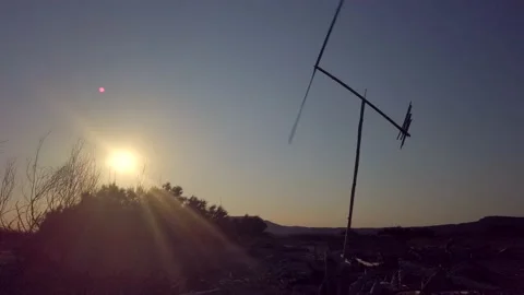 Hand made wind mill made with reeds at beach sunset Stock Footage 138798415