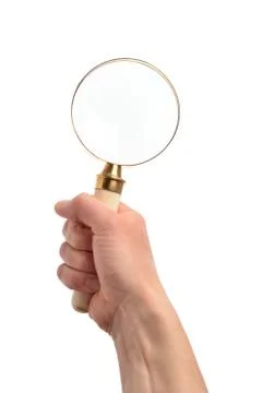 Hand with a magnifier Stock Photos