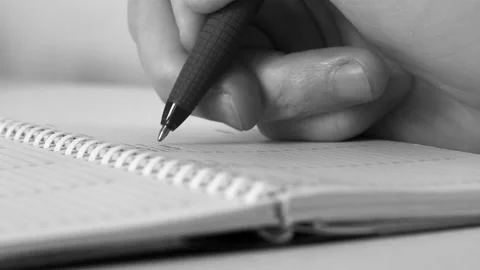 Hand makes notes in a paper notebook Stock Footage 234543042