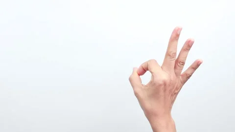 Hand making the gesture of "ok" Stock Footage 244698429