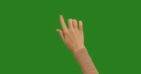 Hand making gestures lines, curves, graphics on chroma key green screen bac.. Stock Photos