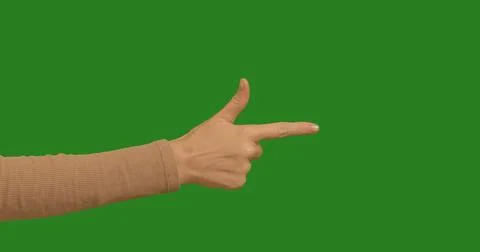 Hand making gestures, with your finger forward on chroma key green screen b.. Stock Photos