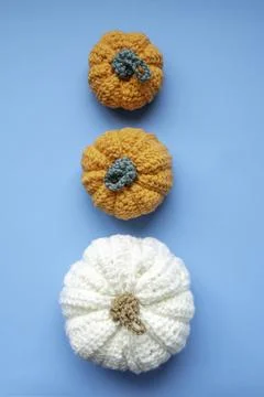 Hand making knitted pumpkins for fall and autumn season decoration Stock Photos