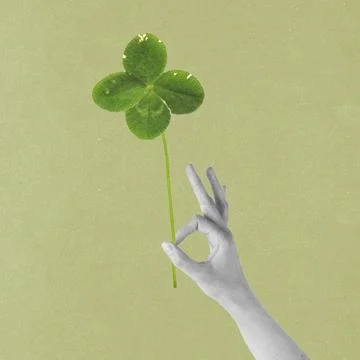 Hand making ok gesture with lucky four-leaf clover Stock Illustration