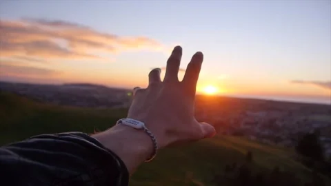 Hand Making Peace Sign At Sunset Over City Stock Footage 346028935