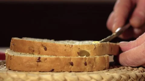 Hand making sandwich with wholemeal bread Stock Footage 268807792