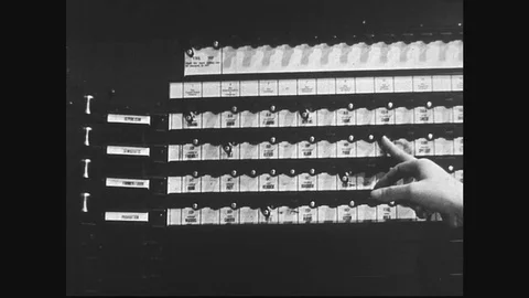 Hand making selections on voting machine / Close up of hand pulling lever / Stock Footage 74534904