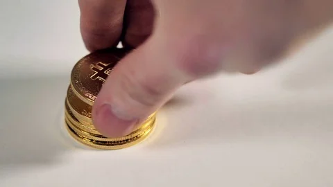 Hand making a stack of Bitcoin coins Worldwide cryptocurrency concept. 스톡 동영상 82641582