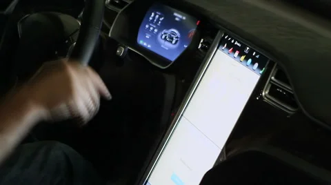 Hand of male driver tapping large touch screen panel in modern electric vehicle 스톡 동영상 65968868