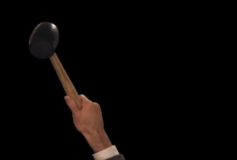 Hand with mallet comes up hits the screen three times version 2 Stock Footage 754705
