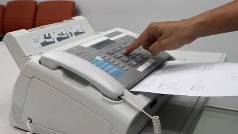 Hand man are using a fax machine in the office, equipment for data transmissi Stock Footage 142670463