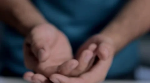 A hand of a man asking for food or money Видео 58509614
