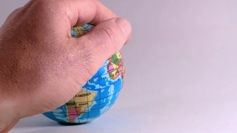 A hand of a man, caresses a globe, ideal footage to explain problems of ecology Stock Footage 97920772