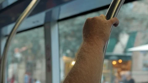 Hand Of Man On The Handrail In The Train Stock Footage 94025219