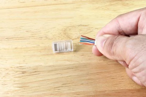Hand of man hold  Cable for use Network internet cable Stock Photos