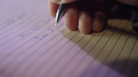 Hand of man holding pen writing answer on question on paper Stock Footage 230693145
