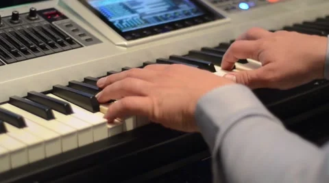 Hand of man keyboad playing Video stock 46446934