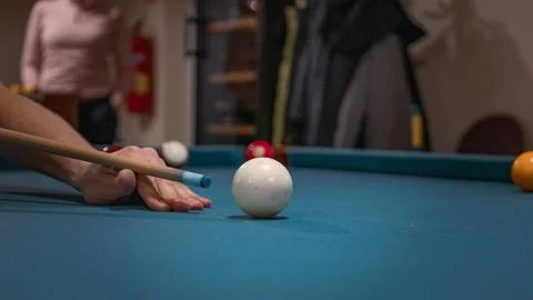 Hand of a man playing billiard Stock Photos