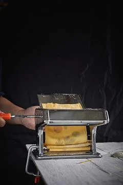 Hand Of Man Preparing Pasta. . Stock Photos