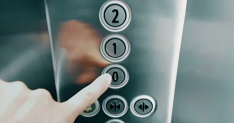 Hand of man press button number of elevator that go up from first to second Video stock 103167554