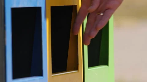 Hand man put bottle plastic trash can. Reduce waste recycle bins. Garbage Stock Footage 161085329