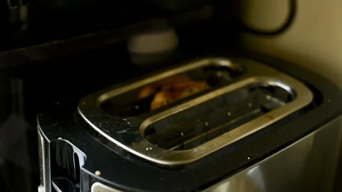 Hand of Man Removes Toasted Bread from Toaster in Full HD Stock-Footage 315237274