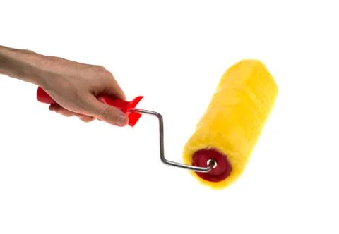 Hand of the man with roller isolated Foto stock