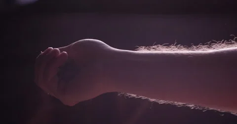 Hand of a man spilling pellets of hops 動画素材 61502825