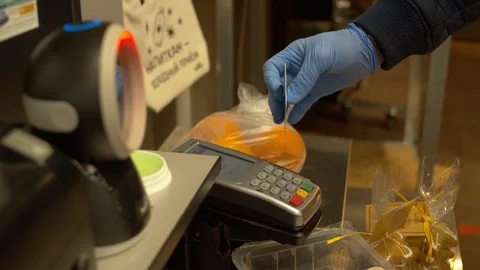 Hand of man swiping card on cash machine Stock Footage 128564506