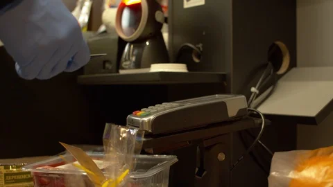 Hand of man swiping card on cash machine Stock Footage 128564508
