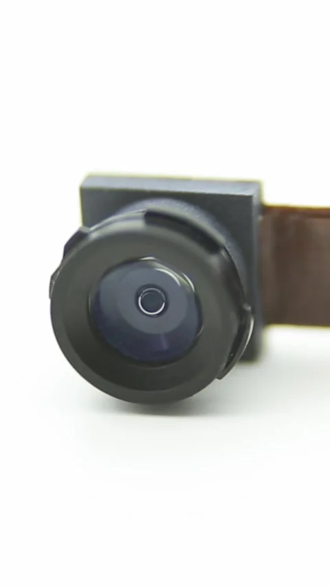 Hand of man take the camera module for mobile phone. Smartphone lens Stock Footage 318742807