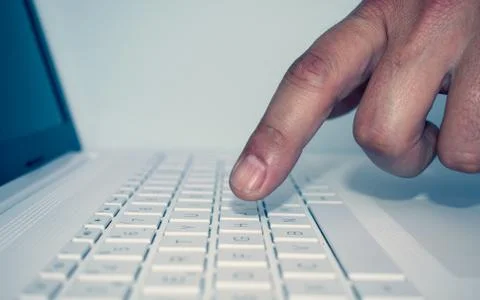 Hand Man touch computer keyboards. Stock Photos