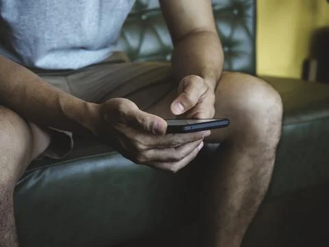 Hand man using digital smartphone. Stock Photos
